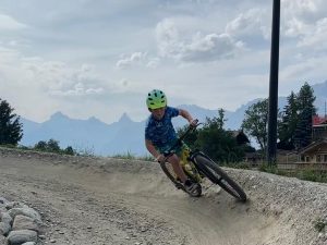 Kid riding the flow trail in Nendaz